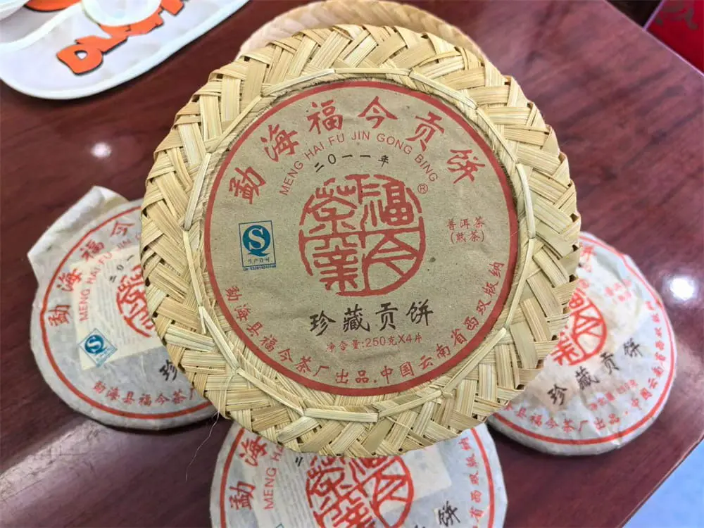 回收福今普洱茶2011年生茶熟茶图2
